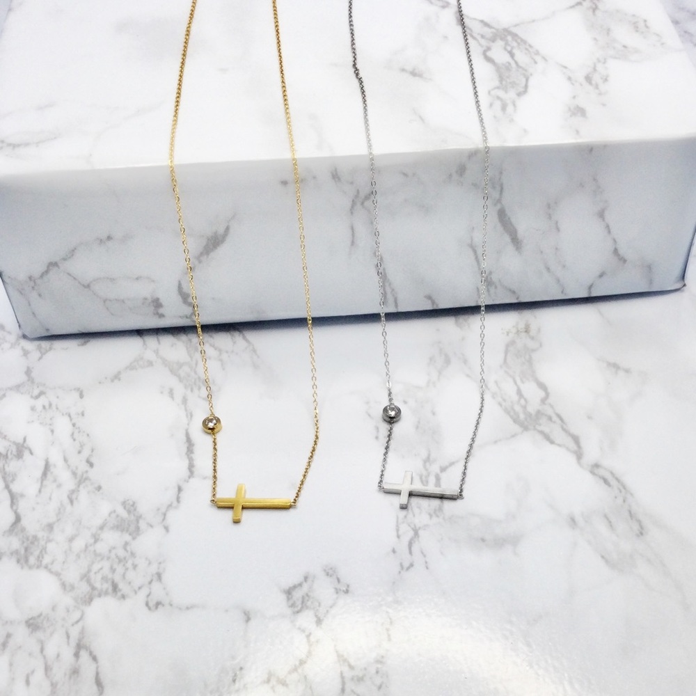 Sideways cross necklace